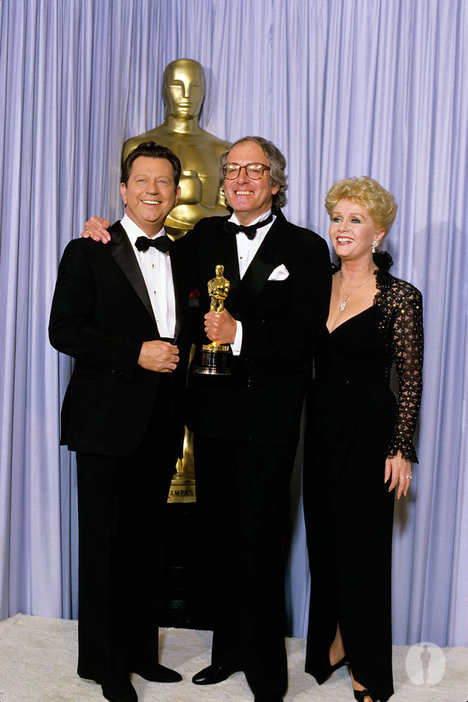 John Barry, Debbie Reynolds and Donald O'Connor at event of The 58th Annual Academy Awards (1986)