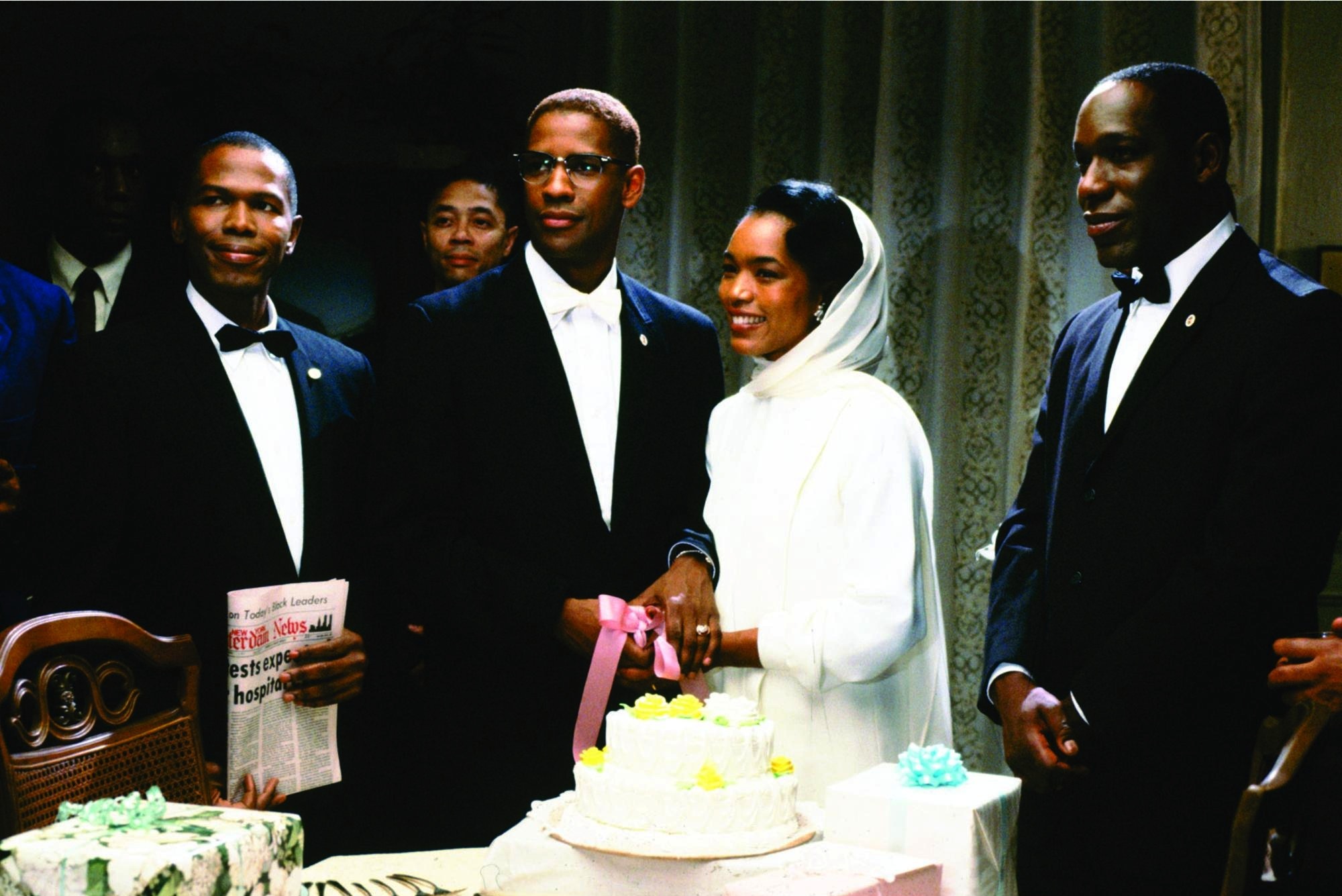 Still of Denzel Washington and Angela Bassett in Malcolm X (1992)
