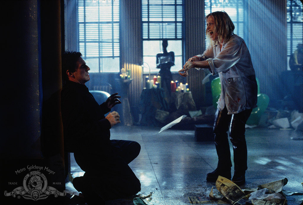 Still of Patricia Arquette and Gabriel Byrne in Stigmata (1999)