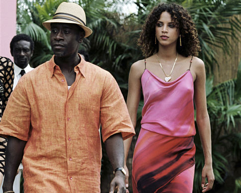 Still of Don Cheadle and Noémie Lenoir in After the Sunset (2004)