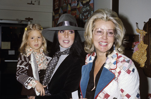 Cher, holding her daughter Chastity Bono, with her mother circa 1970s