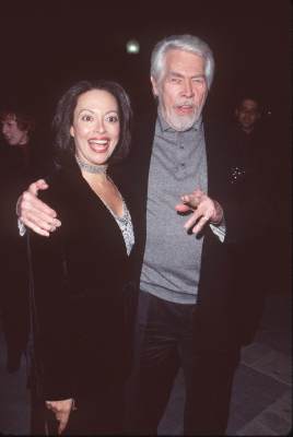 James Coburn at event of Payback (1999)