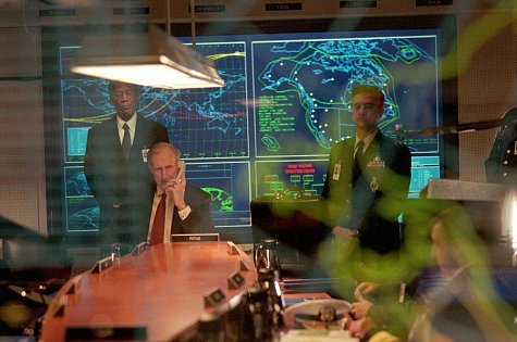 (Left) Morgan Freeman as DCI William Cabot and (center left) James Cromwell as President Fowler in 