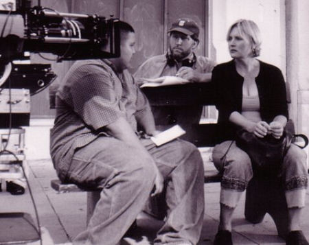 Robert Peters (center) directs Louis Aguilar and Denise Crosby in 