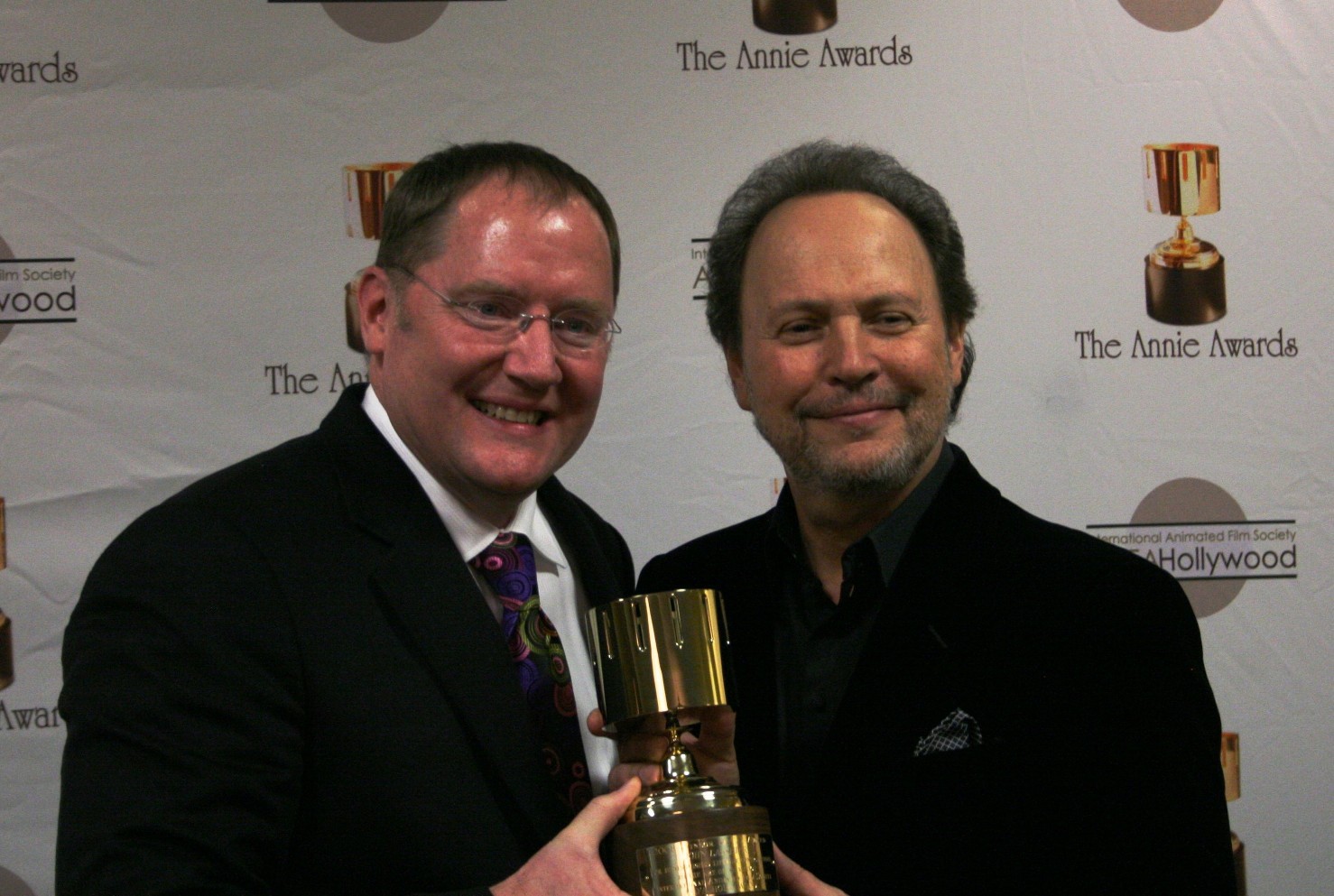 John Lasseter, winner of the Ub Iwerks award, and Billy Crystal, who presented it to him