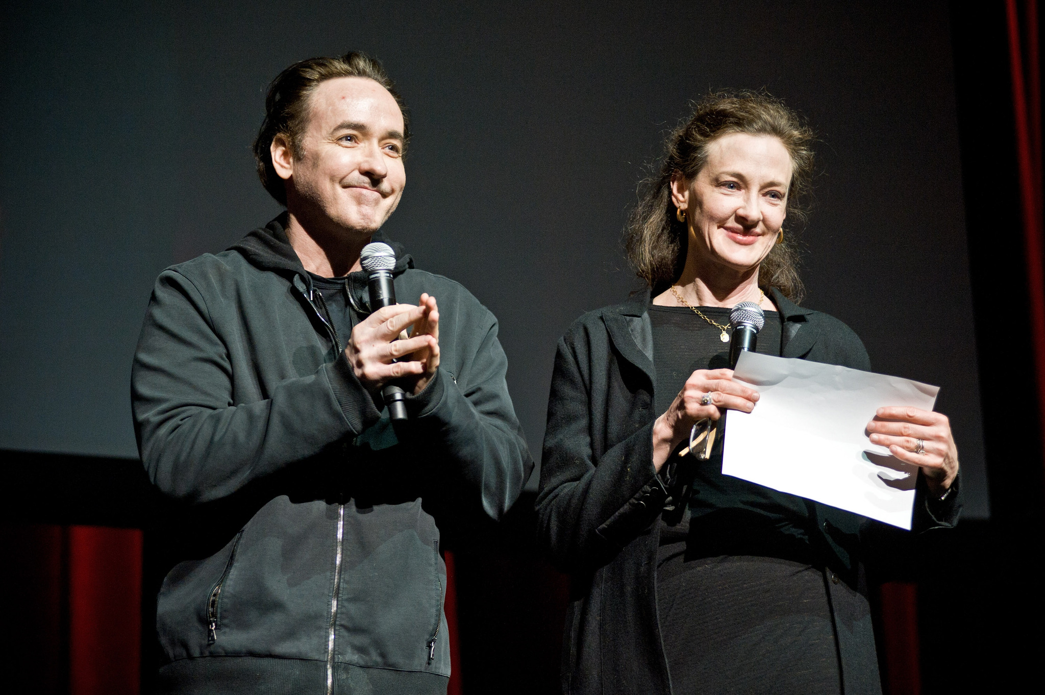 John and Joan Cusack attend the Roger Ebert Memorial Tribute at Chicago Theatre on April 11, 2013 in Chicago, Illinois.