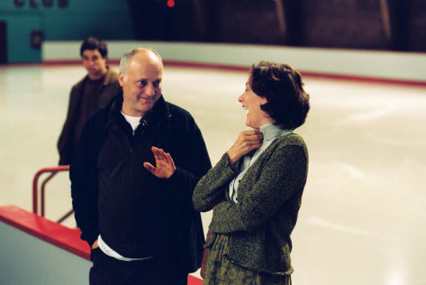 Behind-the-scenes L-R: Trevor Blumas (b.g.), Director Tim Fywell, Joan Cusack.