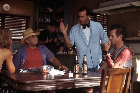 Director DJ Caruso (standing) discusses the scene at Pooh-Bear's table with Val Kilmer (right) and Vincent D'Onofrio (left).