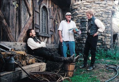 Matt Damon, Heath Ledger and Stephen Bridgewater in The Brothers Grimm (2005)