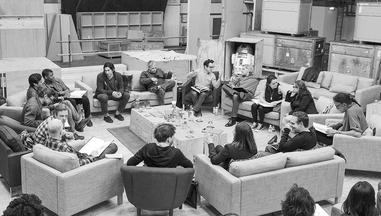 April 29th, Pinewood Studios, UK - Writer/Director/Producer J.J Abrams (top center right) at the cast read-through of Star Wars Episode VII at Pinewood Studios with (clockwise from right) Harrison Ford, Daisy Ridley, Carrie Fisher, Peter Mayhew, Producer Bryan Burk, Lucasfilm President and Producer Kathleen Kennedy, Domhnall Gleeson, Anthony Daniels, Mark Hamill, Andy Serkis, Oscar Isaac, John Boyega, Adam Driver and Writer Lawrence Kasdan.
