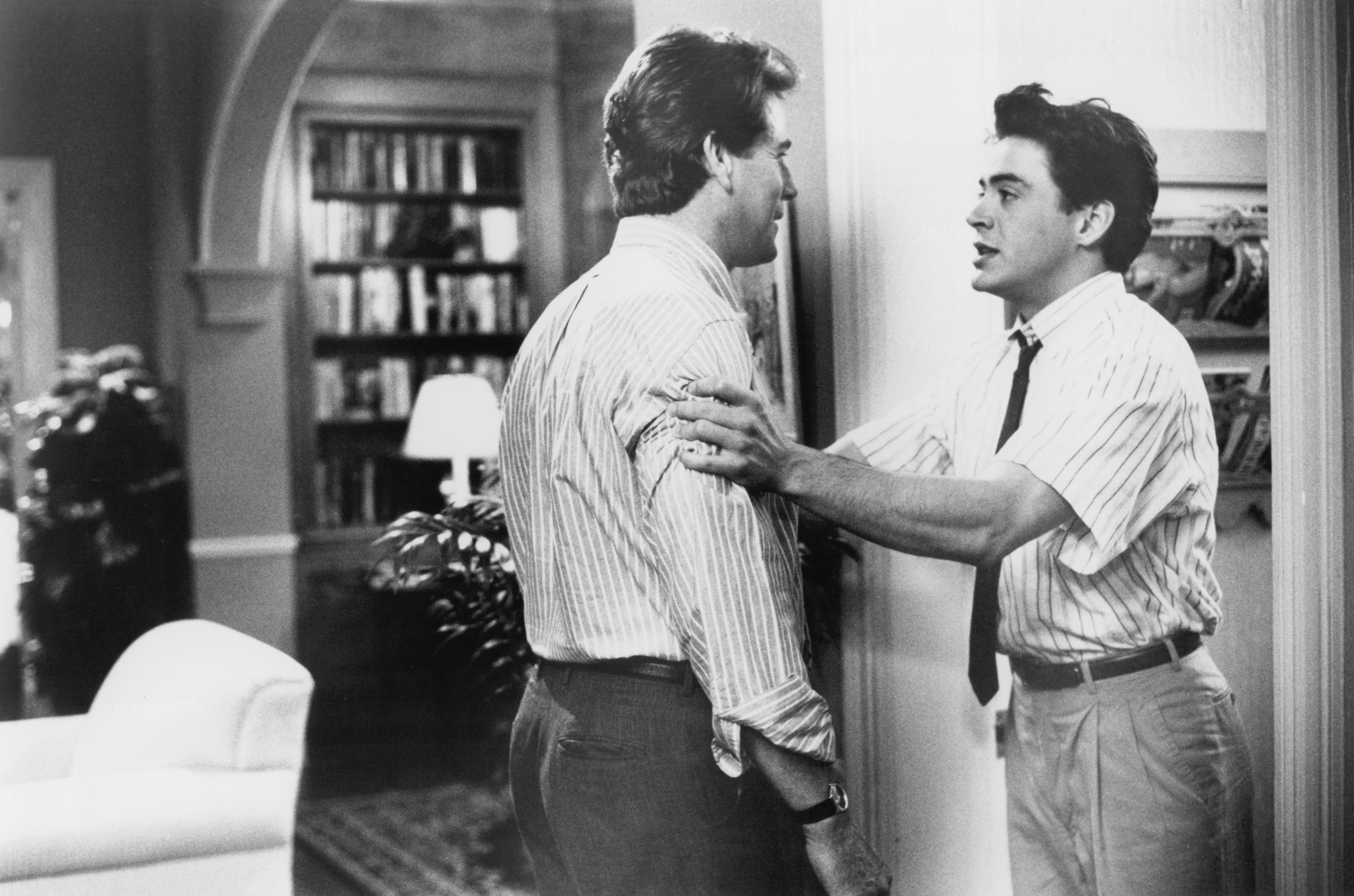 Still of Robert Downey Jr. and Ryan O'Neal in Chances Are (1989)