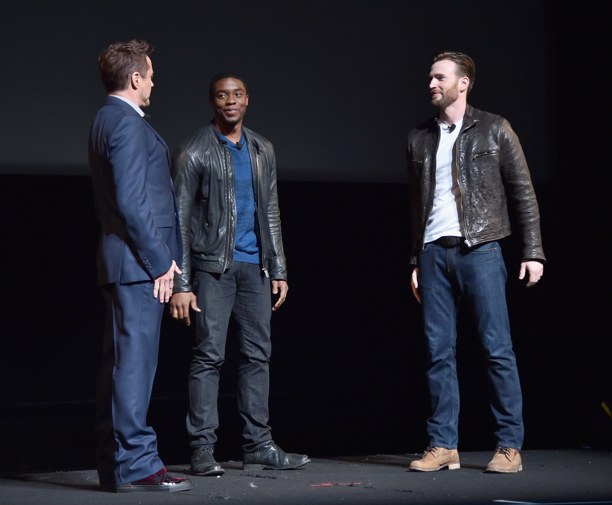 Robert Downey Jr., Chris Evans and Chadwick Boseman at event of Black Panther (2018)