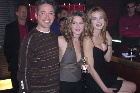 Ali Hillis (center), Robert Downey Jr. (right), and Michelle Mougnahan (left) from the wrap party for KISS, KISS, BANG, BANG