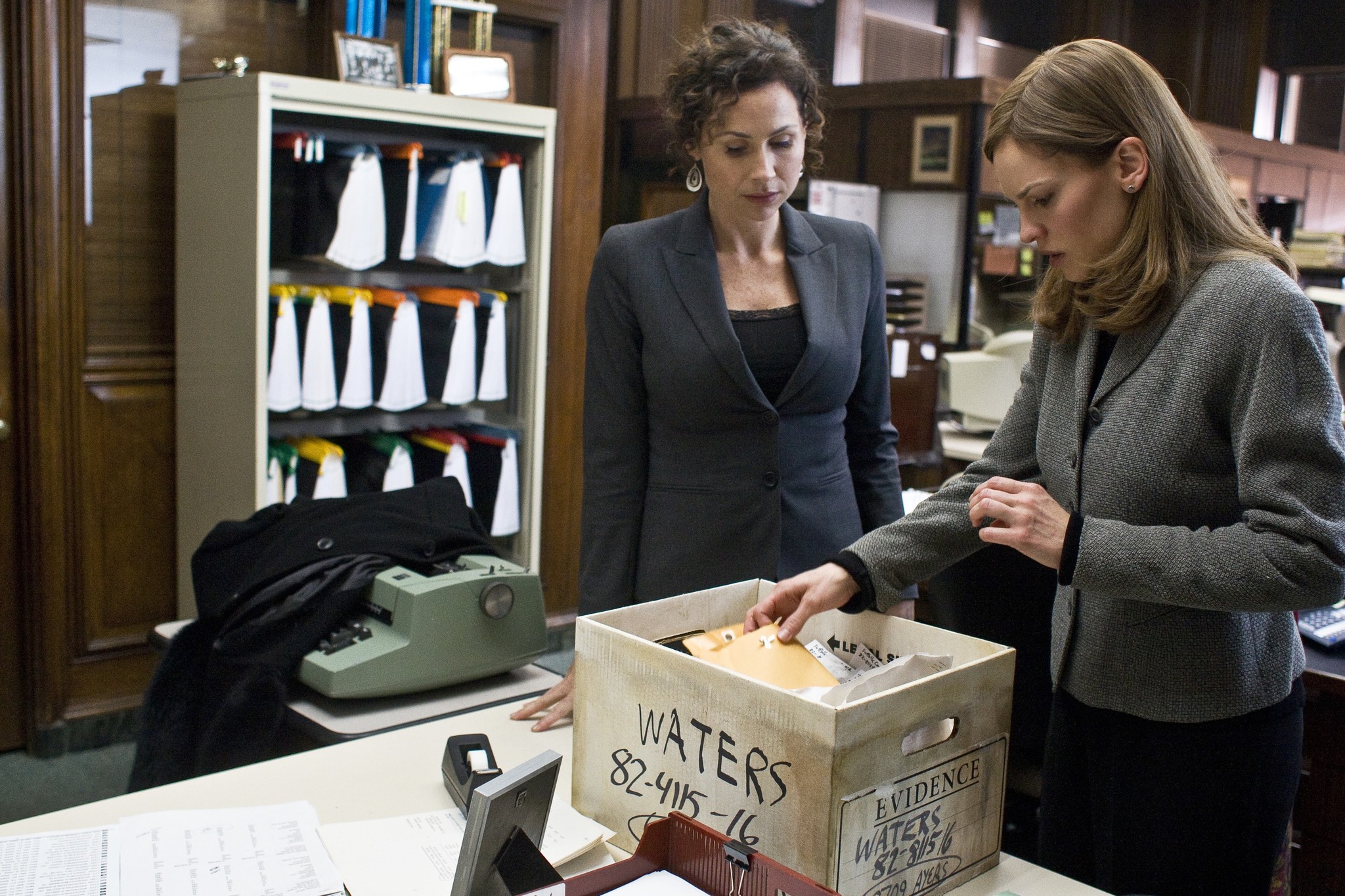 Still of Minnie Driver and Hilary Swank in Conviction (2010)