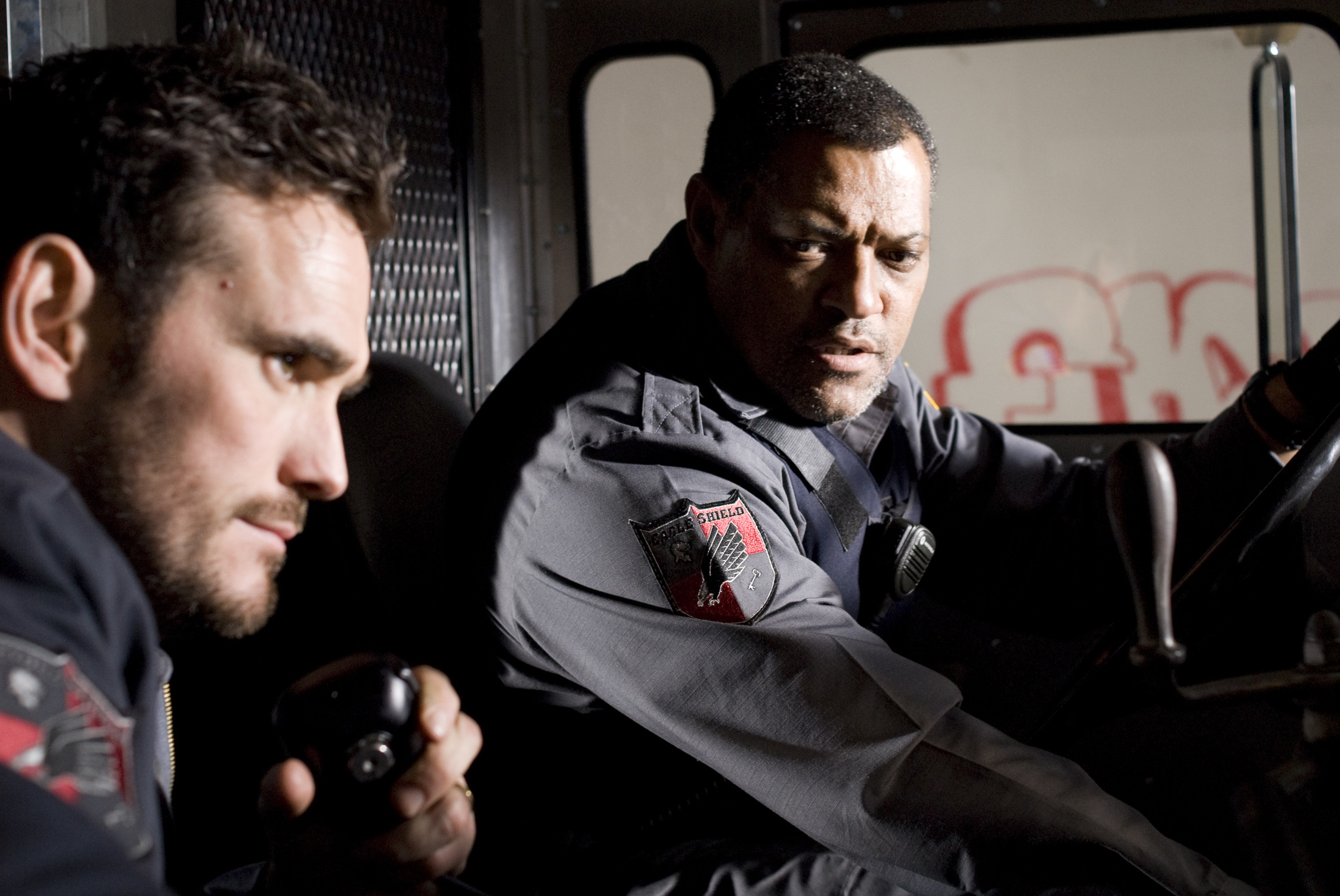 Still of Matt Dillon and Laurence Fishburne in Armored (2009)