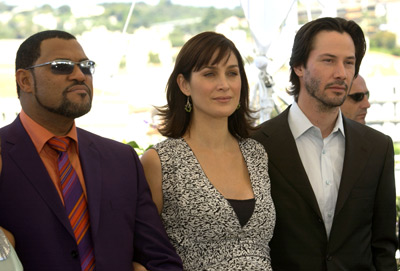 Keanu Reeves, Laurence Fishburne and Carrie-Anne Moss at event of Matrica: Perkrauta (2003)