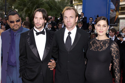 Keanu Reeves, Laurence Fishburne, Carrie-Anne Moss and Hugo Weaving at event of Matrica: Perkrauta (2003)