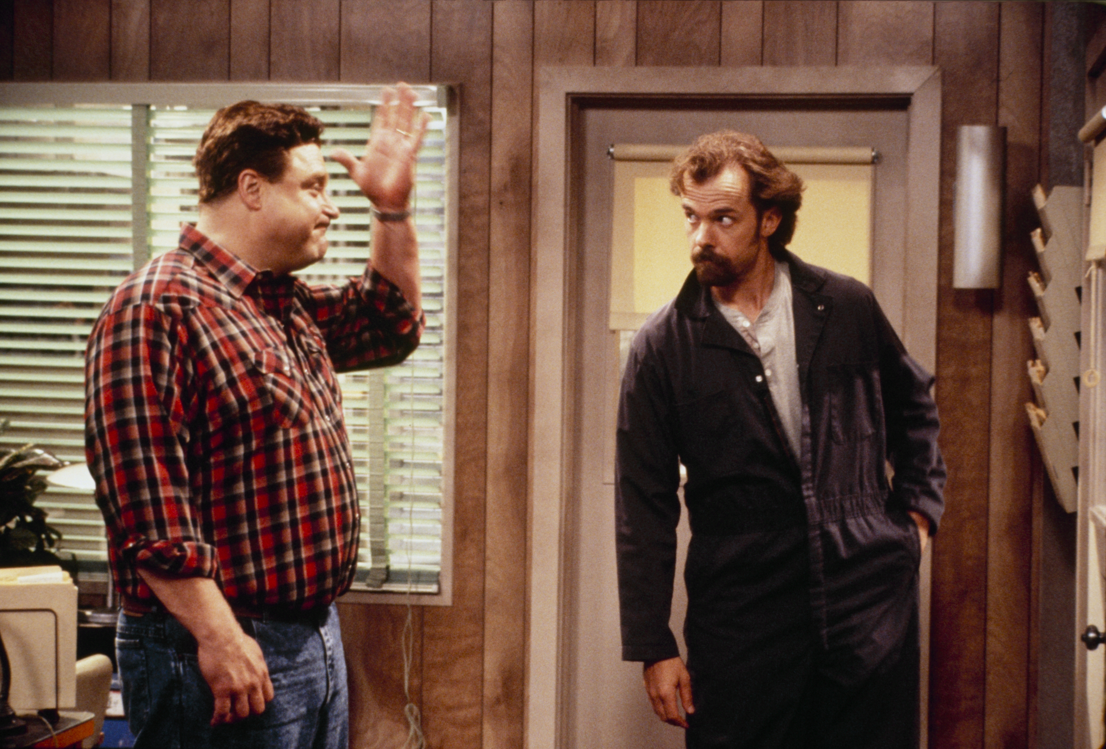 Still of John Goodman and Michael O'Keefe in Roseanne (1988)