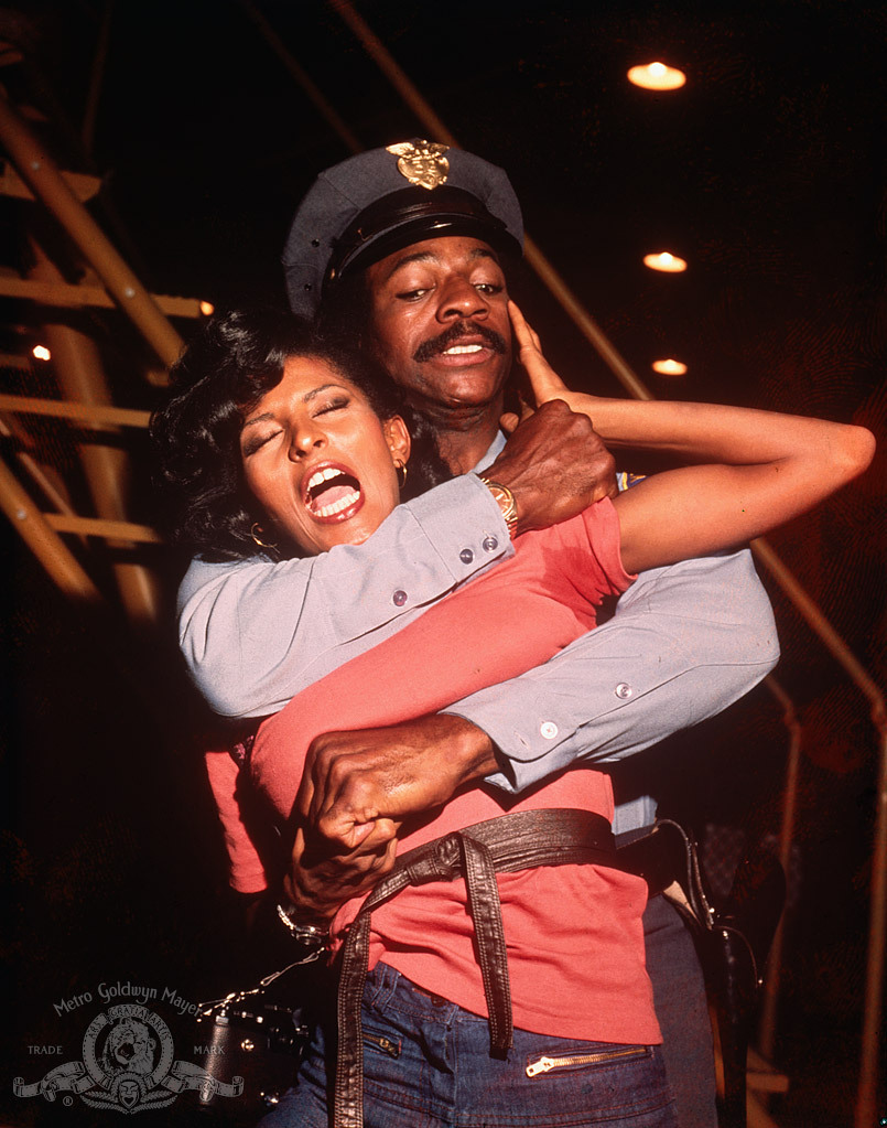 Still of Pam Grier and Carl Weathers in Friday Foster (1975)