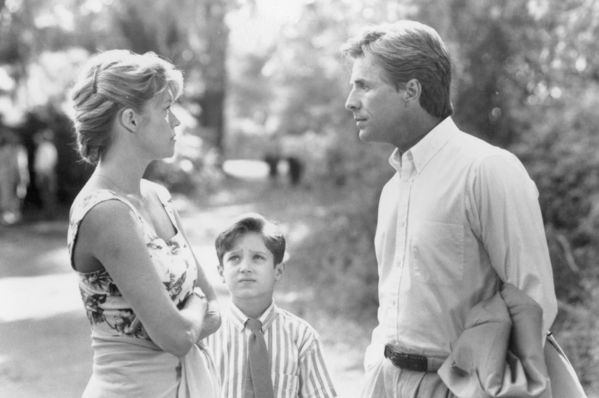 Still of Melanie Griffith, Don Johnson and Elijah Wood in Paradise (1991)