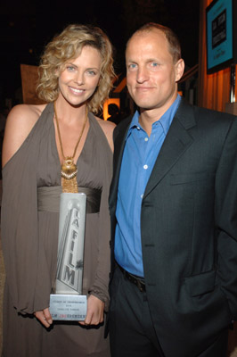 Charlize Theron and Woody Harrelson