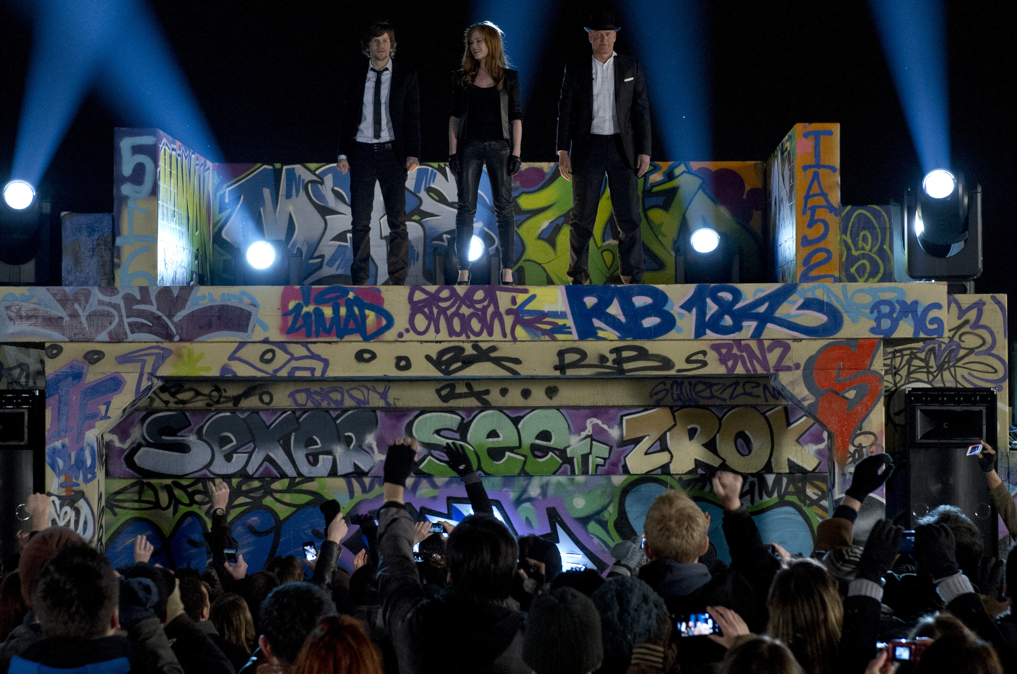 Still of Woody Harrelson, Jesse Eisenberg and Isla Fisher in Apgaules meistrai (2013)