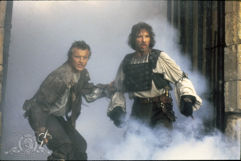 Still of Rutger Hauer and Brion James in Flesh+Blood (1985)
