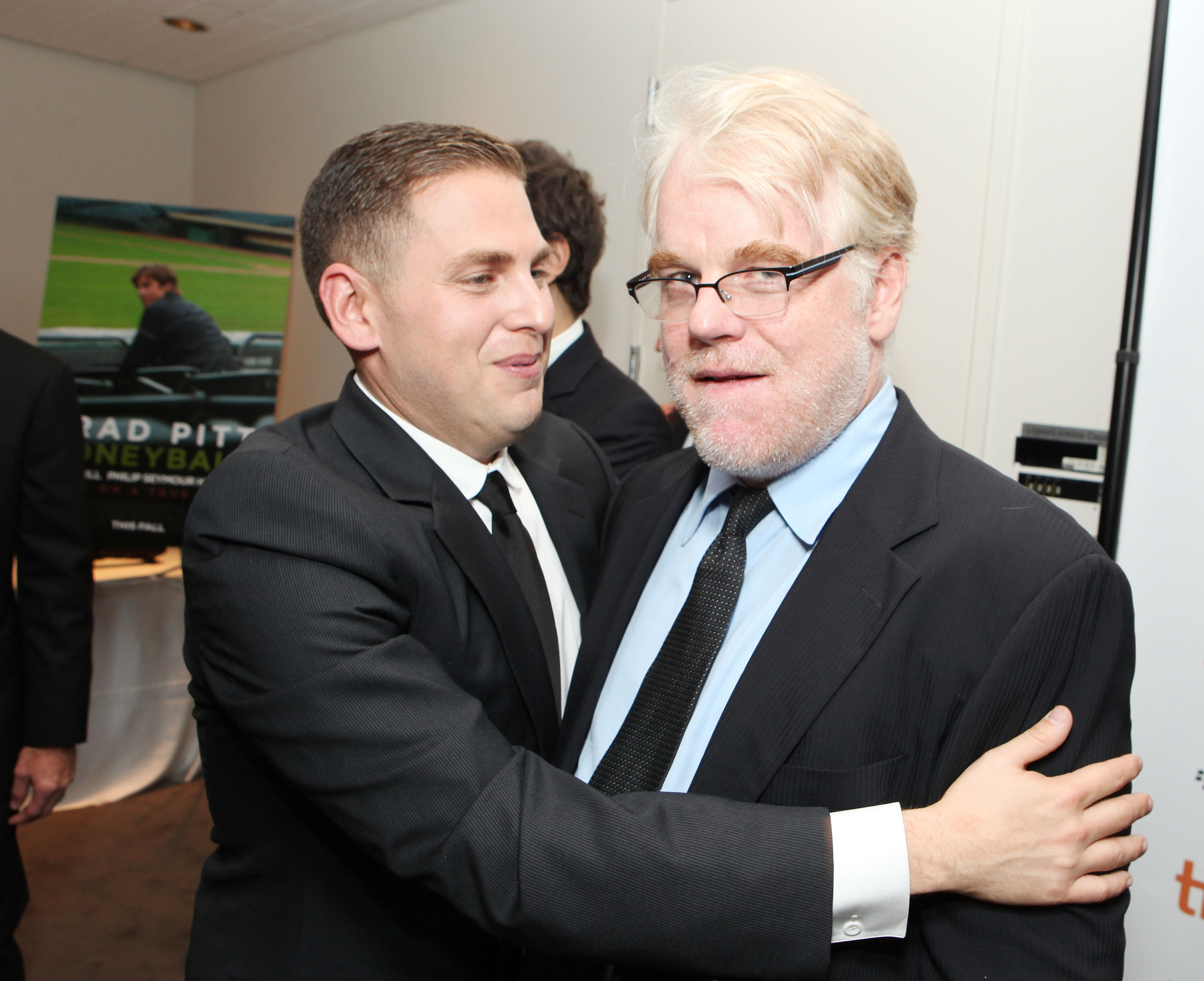Philip Seymour Hoffman and Jonah Hill at event of Zmogus, pakeites viska (2011)