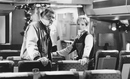 Lauren Holly and Robert Butler in Turbulence (1997)