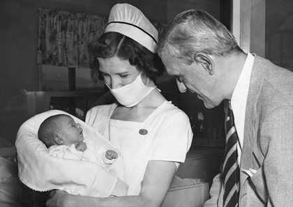 Boris Karloff with infant daughter