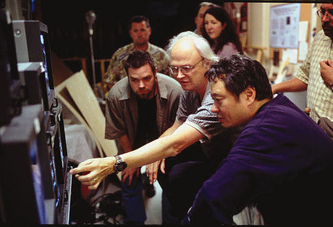 VFX Supervisor DENNIS MUREN discusses with Director ANG LEE.