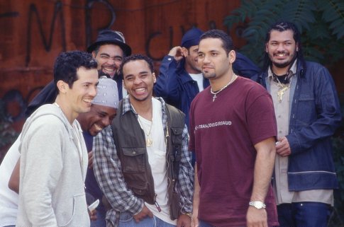 John Leguizamo (left) and Vincent Laresca (second from right) take five with friends on the set.