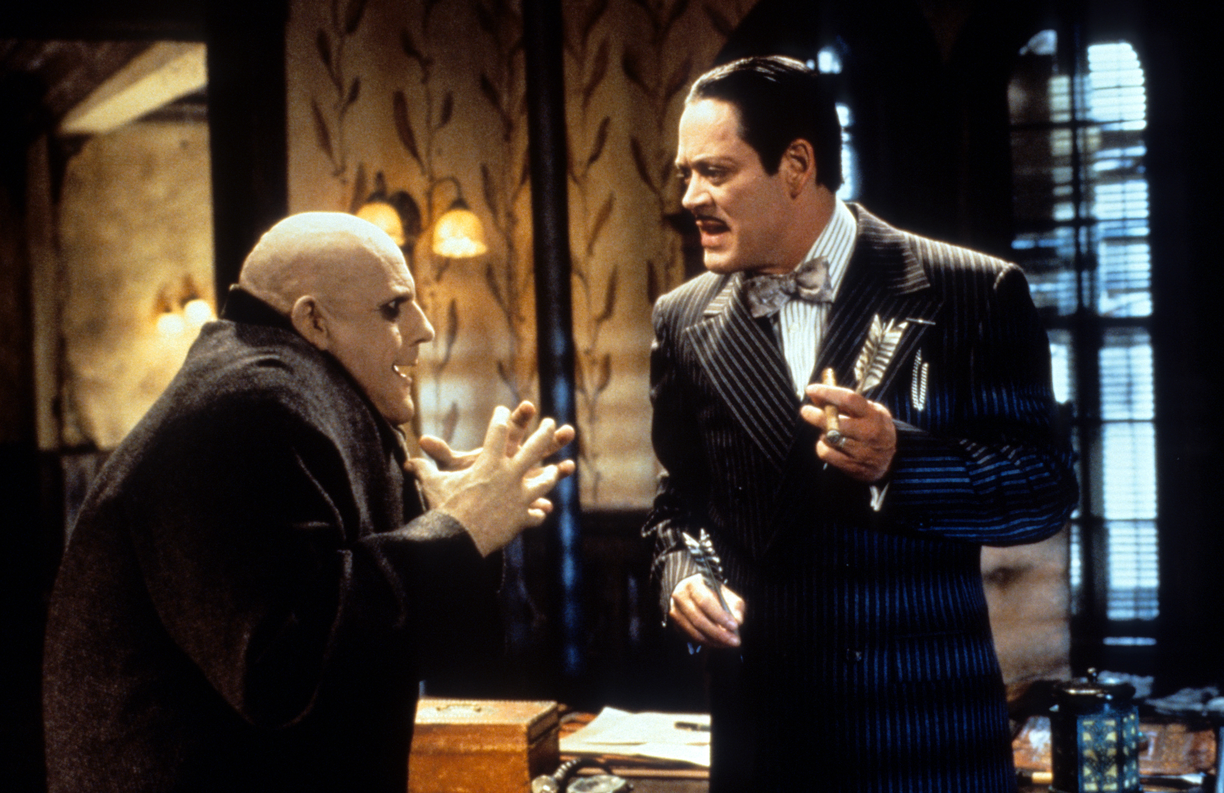 Still of Raul Julia and Christopher Lloyd in Addams Family Values (1993)