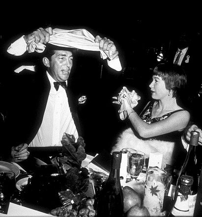 Dean Martin and Shirley Maclaine at Thailan Benefit thrown by Debbie Reynolds, c. 1960.