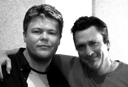 Scott Duthie and Michael Madsen pose for a publicity still.
