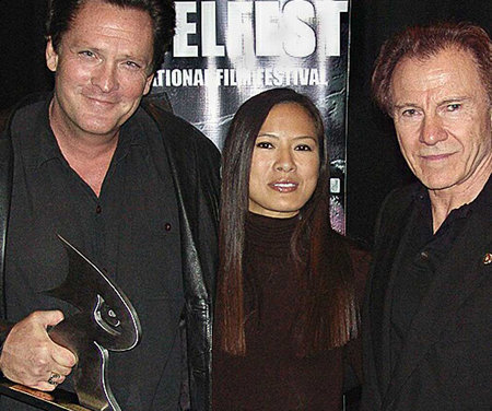 Michael Madsen receives 1st Annual Equinoxe Rebel Award from Grace Kosaka and Harvey Keitel. (Sept. 11, 2005)