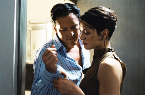 Still of Michael Madsen and Asia Argento in Boarding Gate (2007)