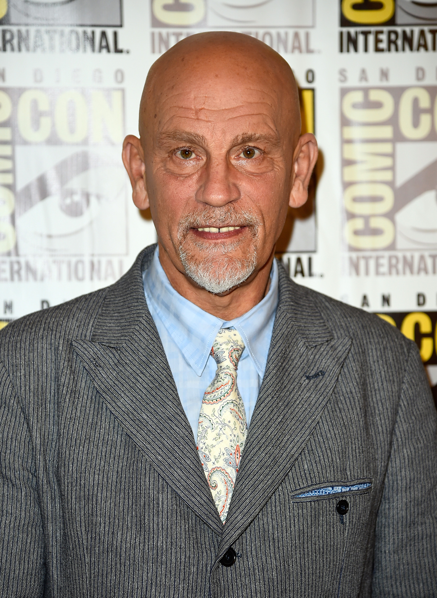 John Malkovich at event of Penguins of Madagascar (2014)