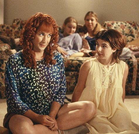 During a sorority house slumber party, Doofer, who's posing as a girl named Roberta (Harland Williams, left), shares intimate secrets with sorority sister Katie (Heather Matarazzo, right).