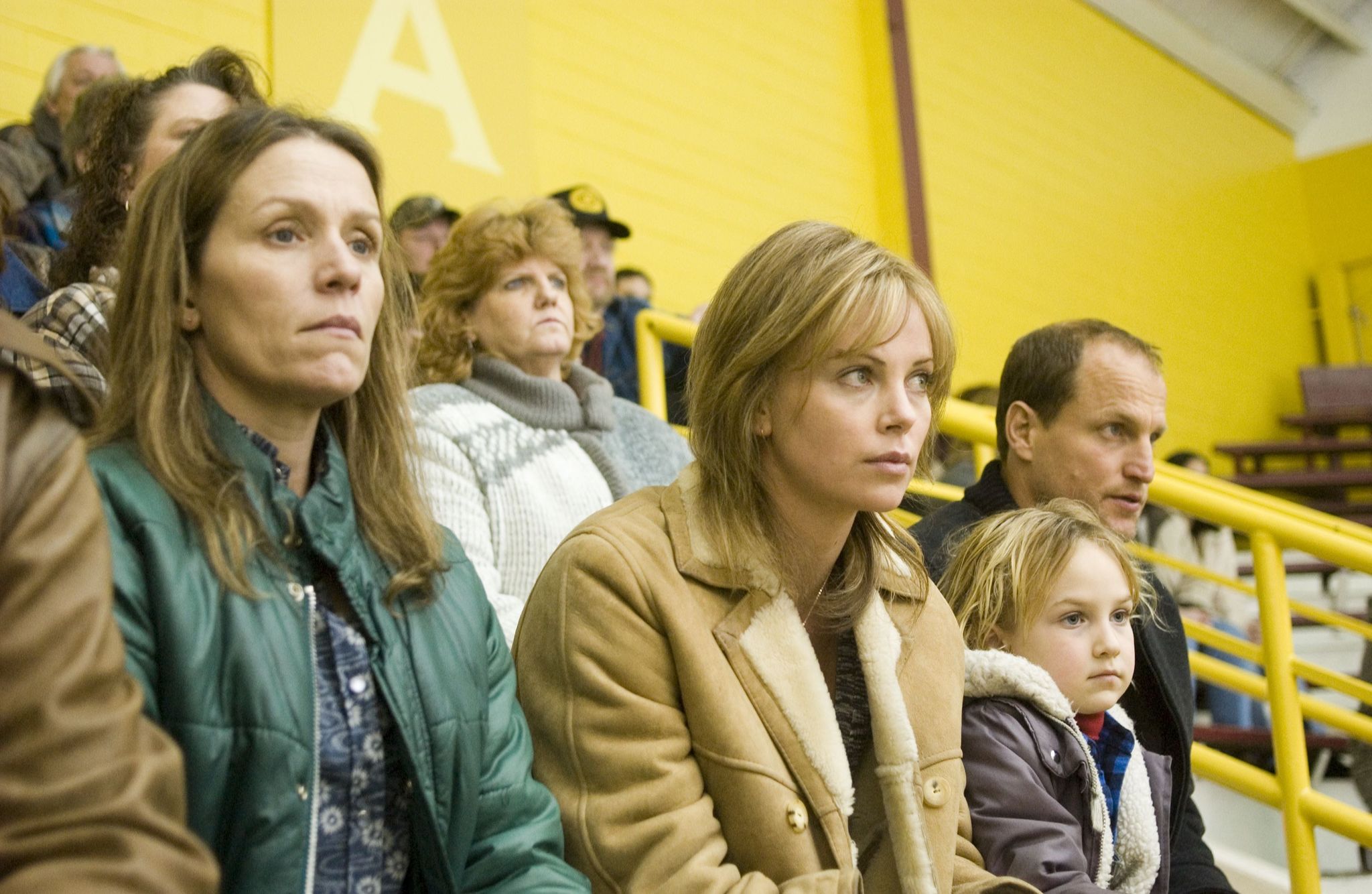 Still of Charlize Theron, Woody Harrelson and Frances McDormand in North Country (2005)