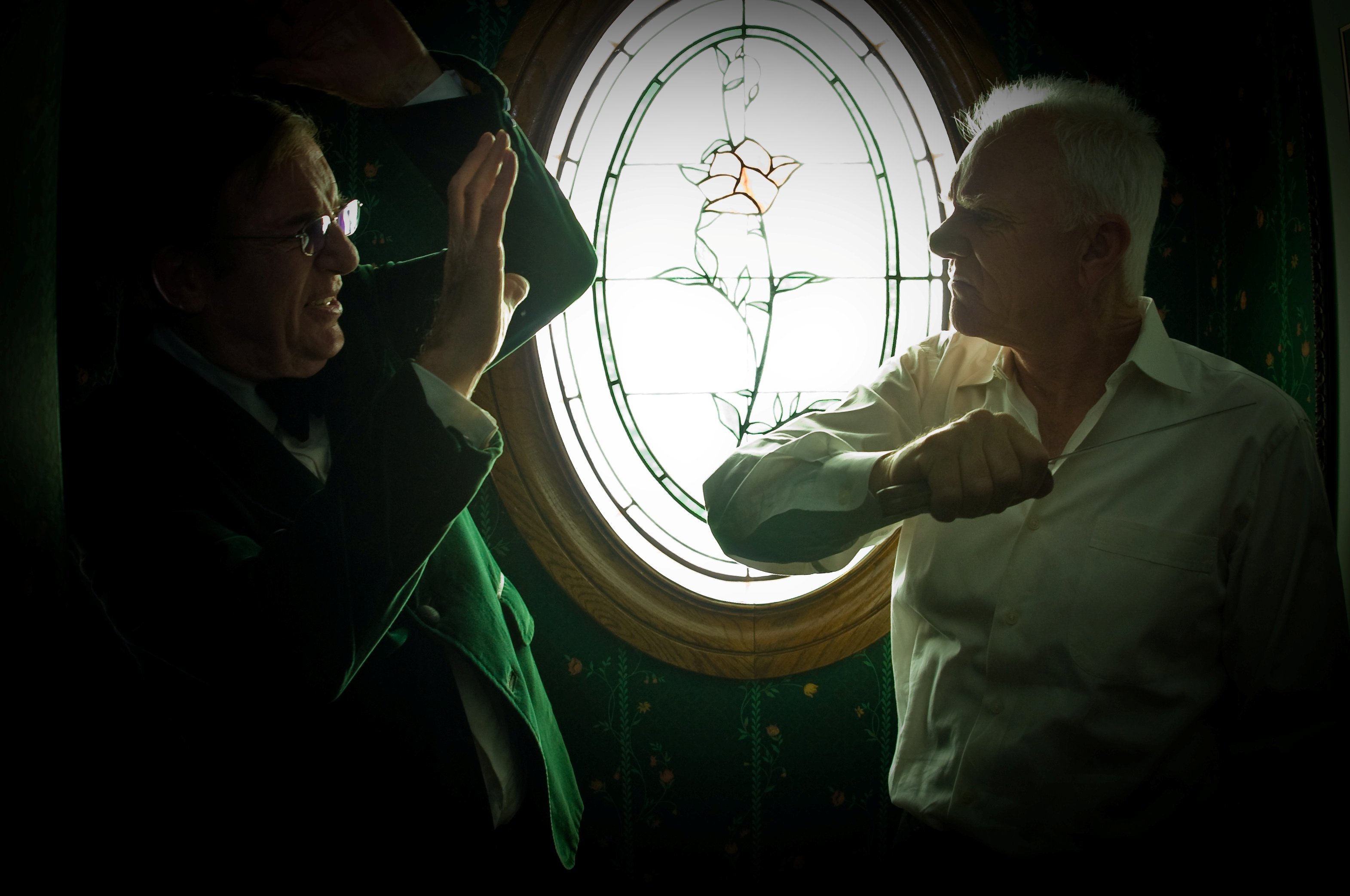 Malcolm McDowell and Peter Bellwood in Monster Butler (2010)