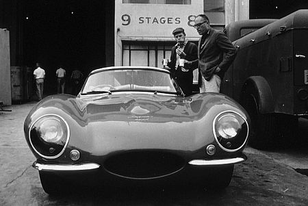Steve McQueen looking at his Jaguar XK-SS with director, John Sturgess, at Goldwyn Studio, 1960. Modern silver gelatin, 11x14, signed. Modern silver gelatin, 16x20, signed. © 1978 Sid Avery MPTV