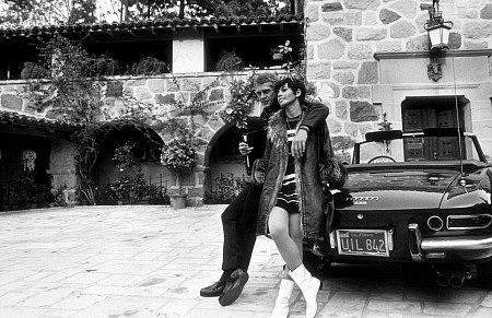 Steve McQueen at home with wife Neile and his 275 GTS Ferrari
