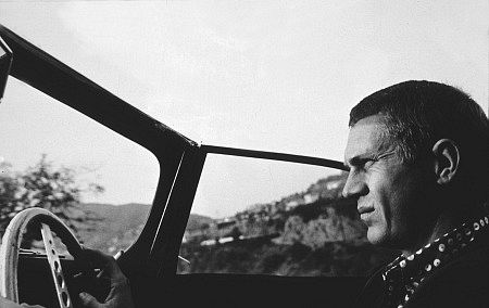 Steve McQueen driving his 1957 XKSS Jaguar in Bell Canyon