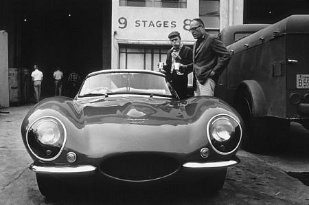 Steve McQueen, director John Sturgess and McQueen's 1957 Jaguar XK SS Hollywood, CA