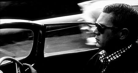 Steve McQueen in his 1957 Jaguar in Hollywood, CA, 1960.