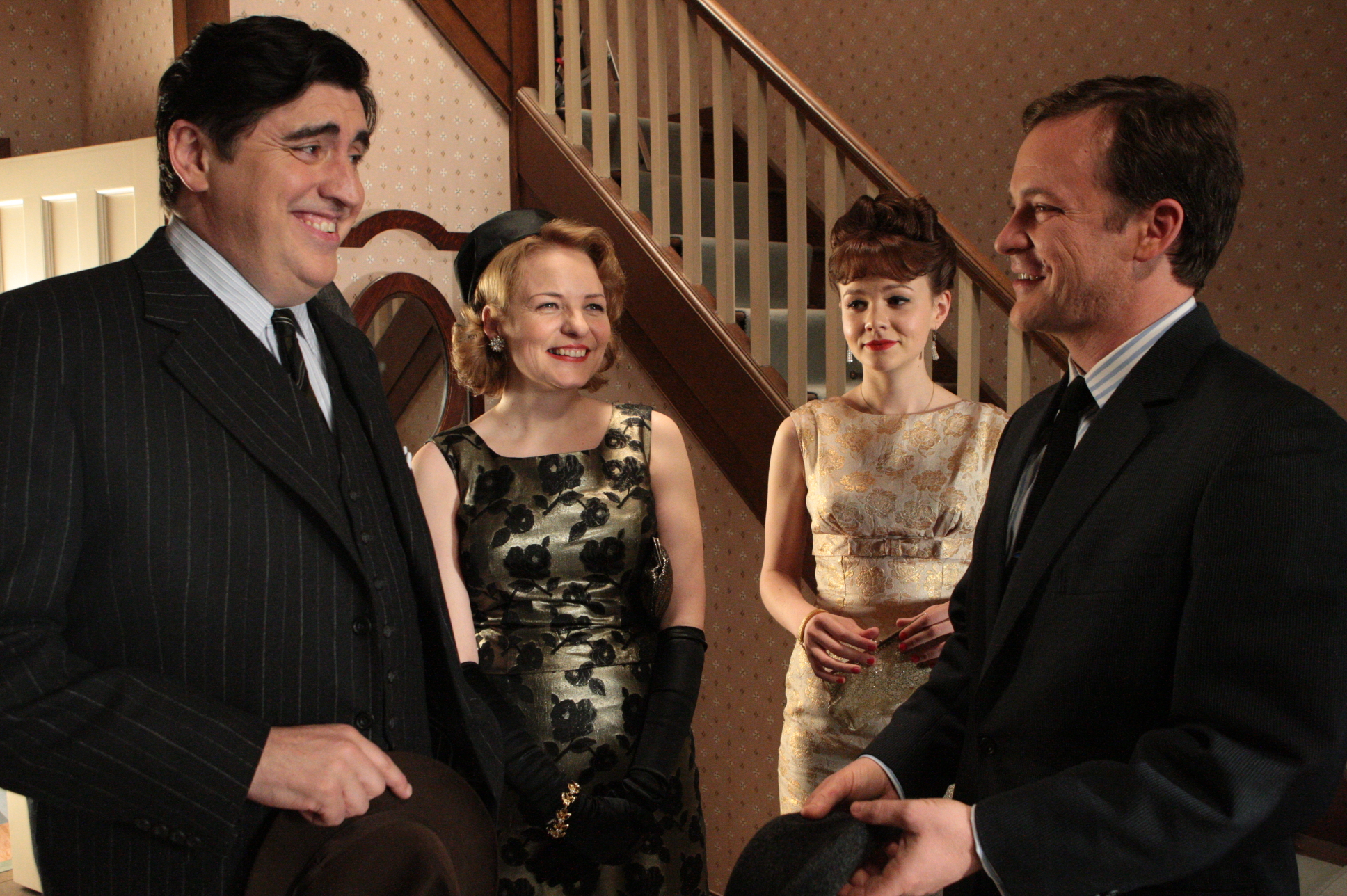 Alfred Molina, Peter Sarsgaard, Cara Seymour and Carey Mulligan in An Education (2009)