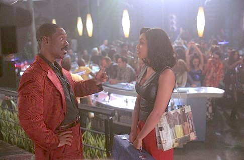 Still of Eddie Murphy and Rosario Dawson in The Adventures of Pluto Nash (2002)