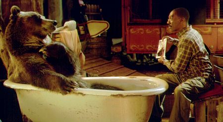 Eddie Murphy (as the good doctor) counsels Archie the bear