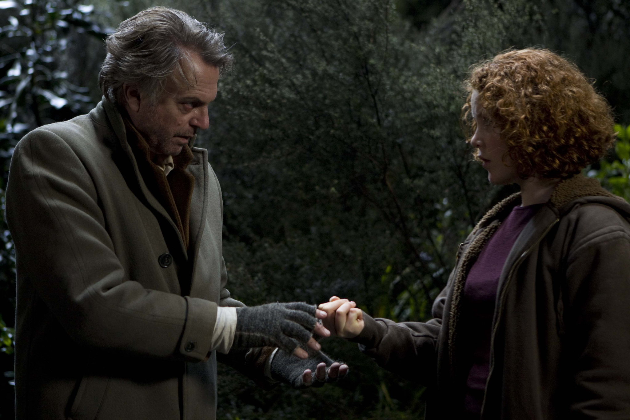 Still of Sam Neill and Sophie McBride in Under the Mountain (2009)
